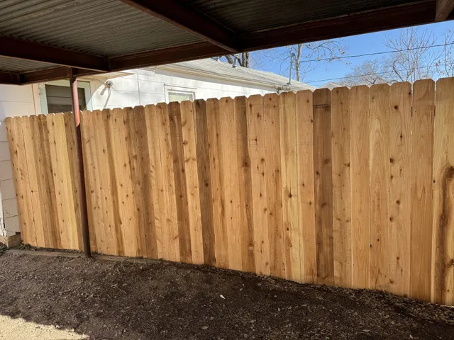 6 ft dog ear cedar privacy fence installed by Hudson Fence Company in Lubbock, TX