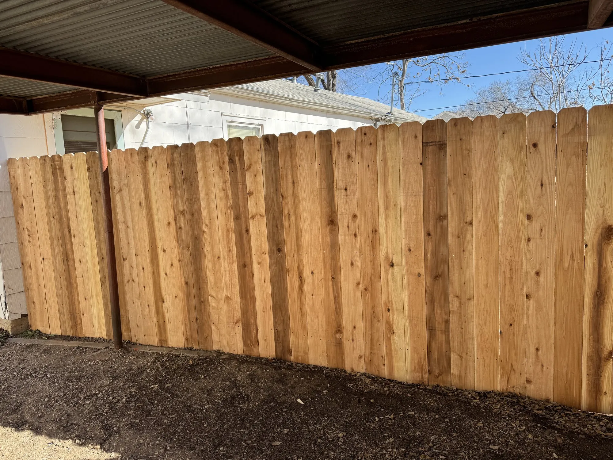 6 ft dog ear cedar privacy fence built by Hudson Fence Company in Lubbock, TX