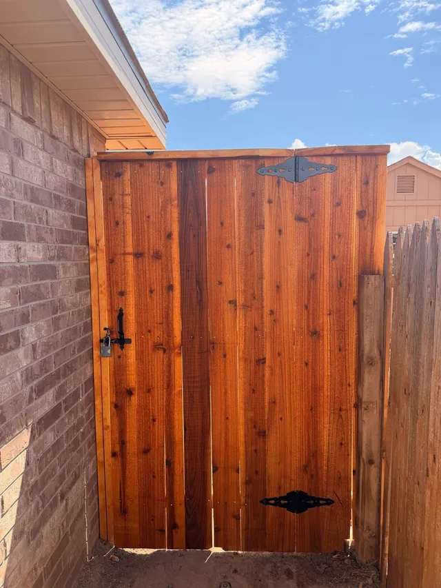 Cedar gate stained with Wood Defender Cedar Tone by Hudson Fence Company in Lubbock, TX